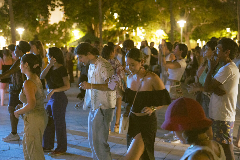 image of people dancing in a park