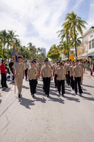 people marching in uniform