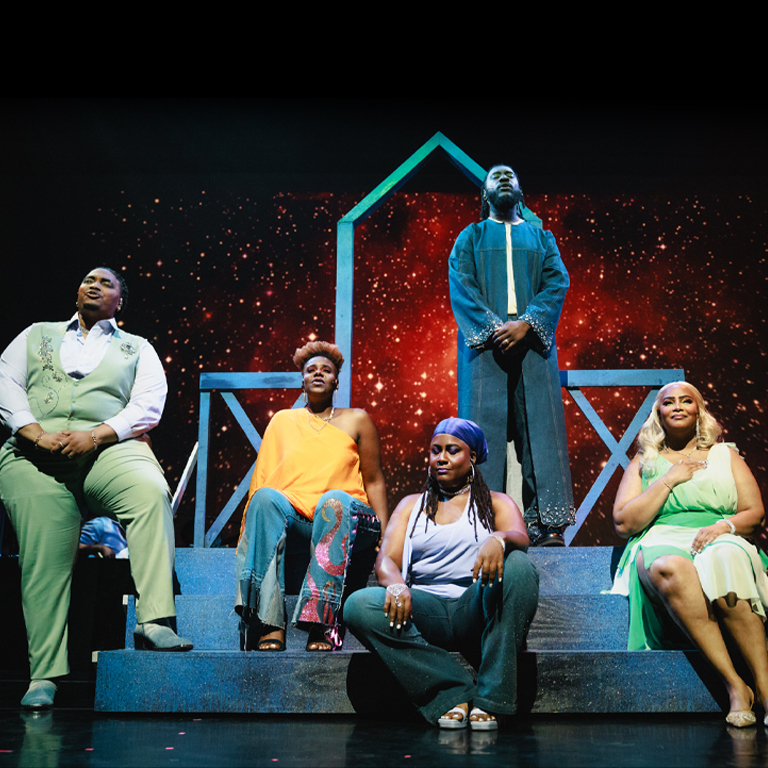 image of performers sitting