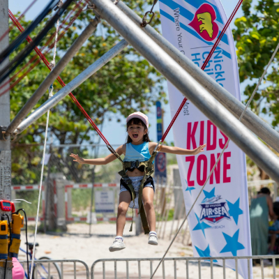 A child jumping at the Nicklaus Children’s Hospital Kids Zone