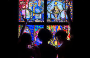 geneva window with people in front looking at it
